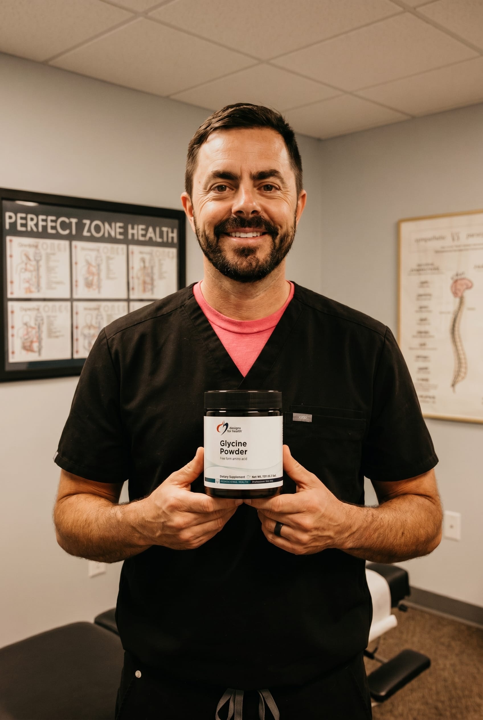 Dr. Bell holding Glycine Powder