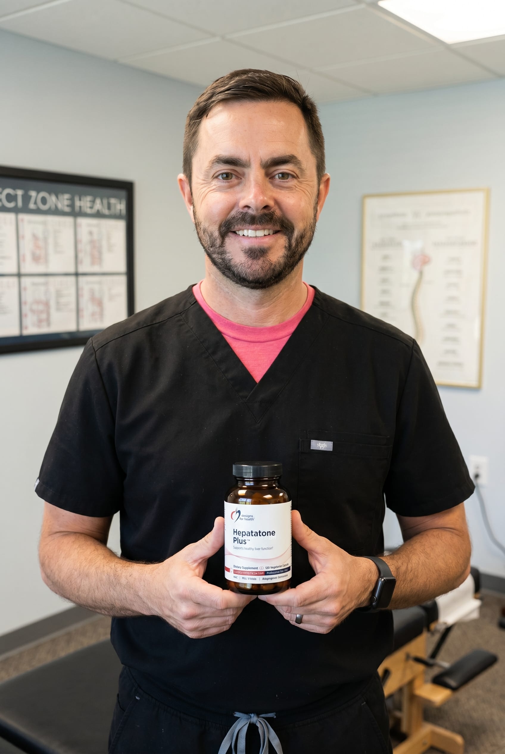 Dr. Bell holding Hepatatone Plus