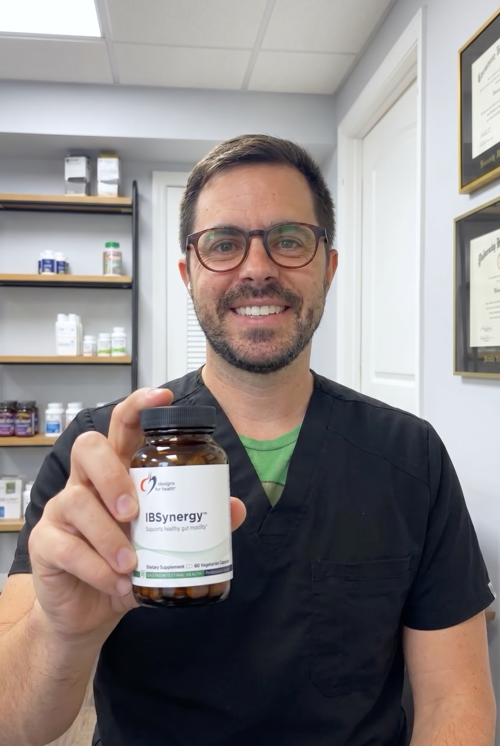 Dr. Bell holding IBSynergy