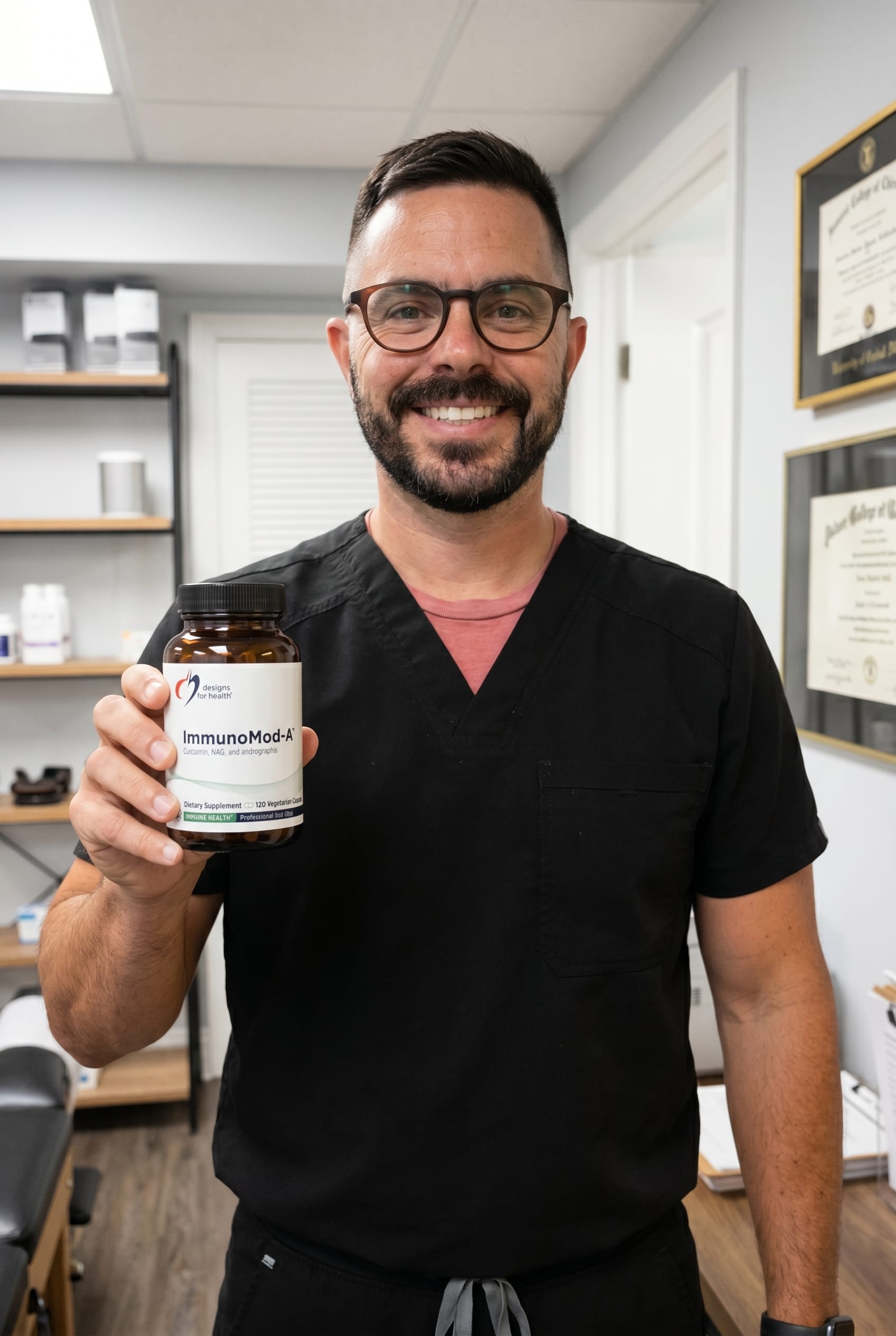 Dr. Bell holding ImmunoMod-A