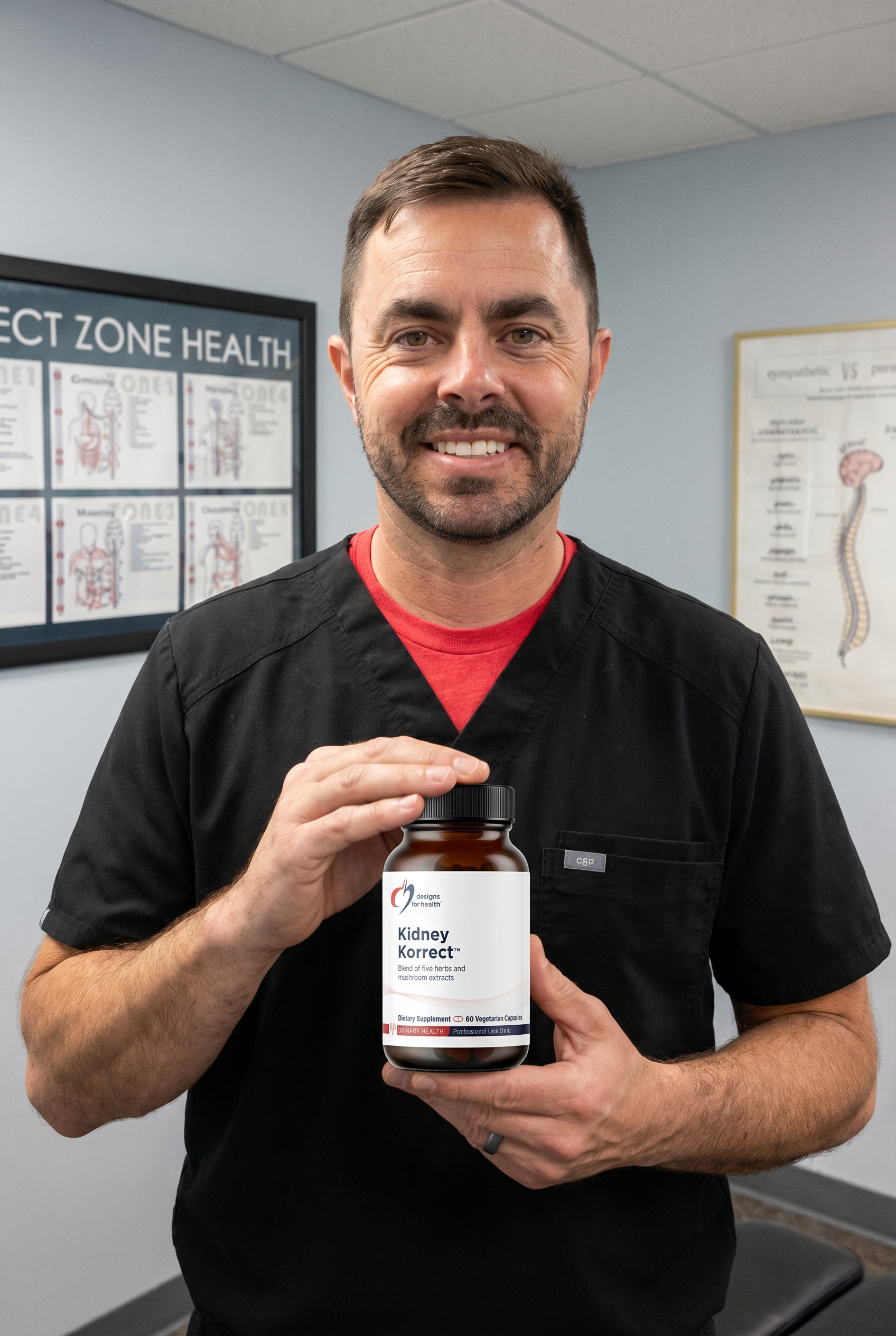 Dr. Bell holding Kidney Korrect