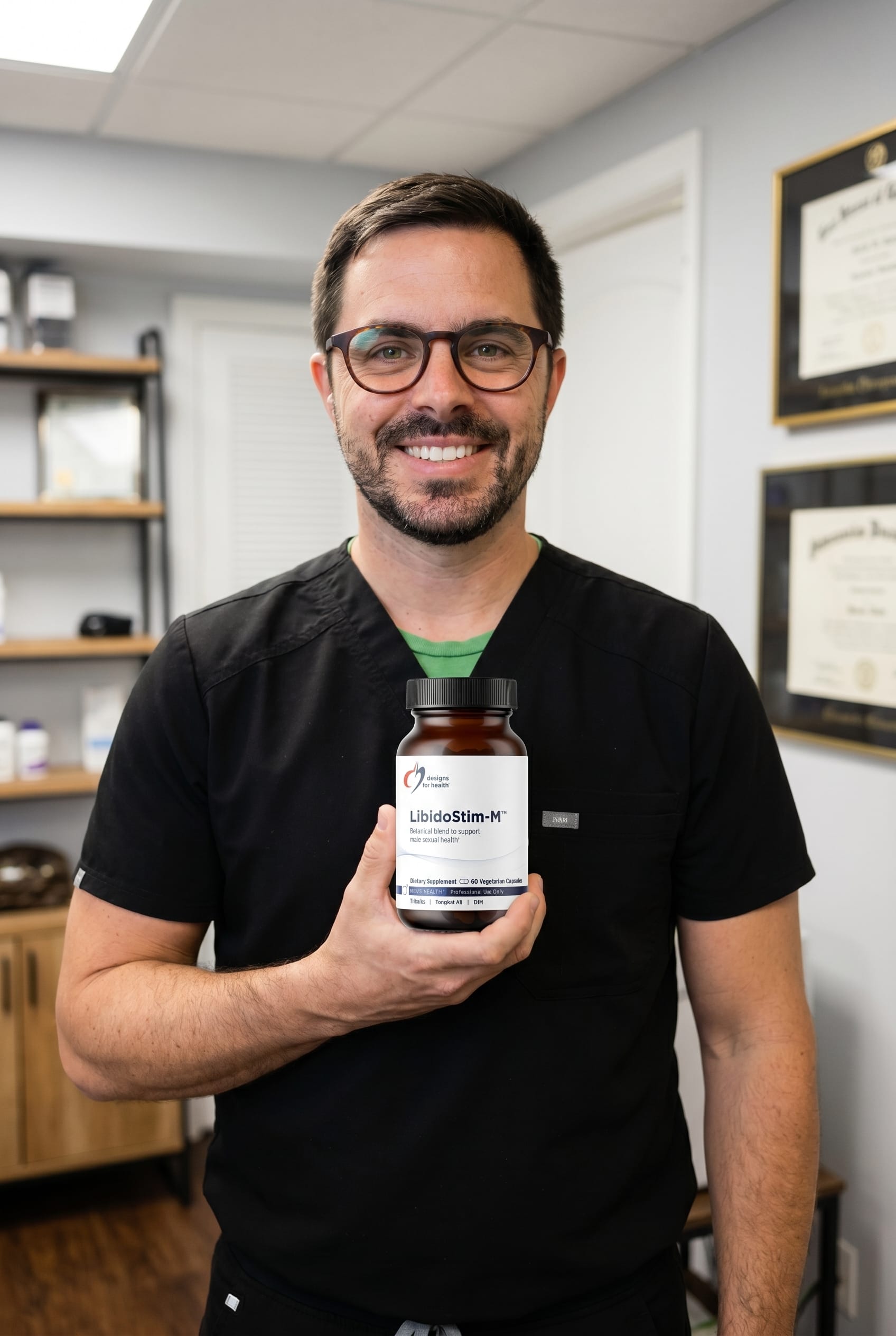 Dr. Bell holding LibidoStim-M