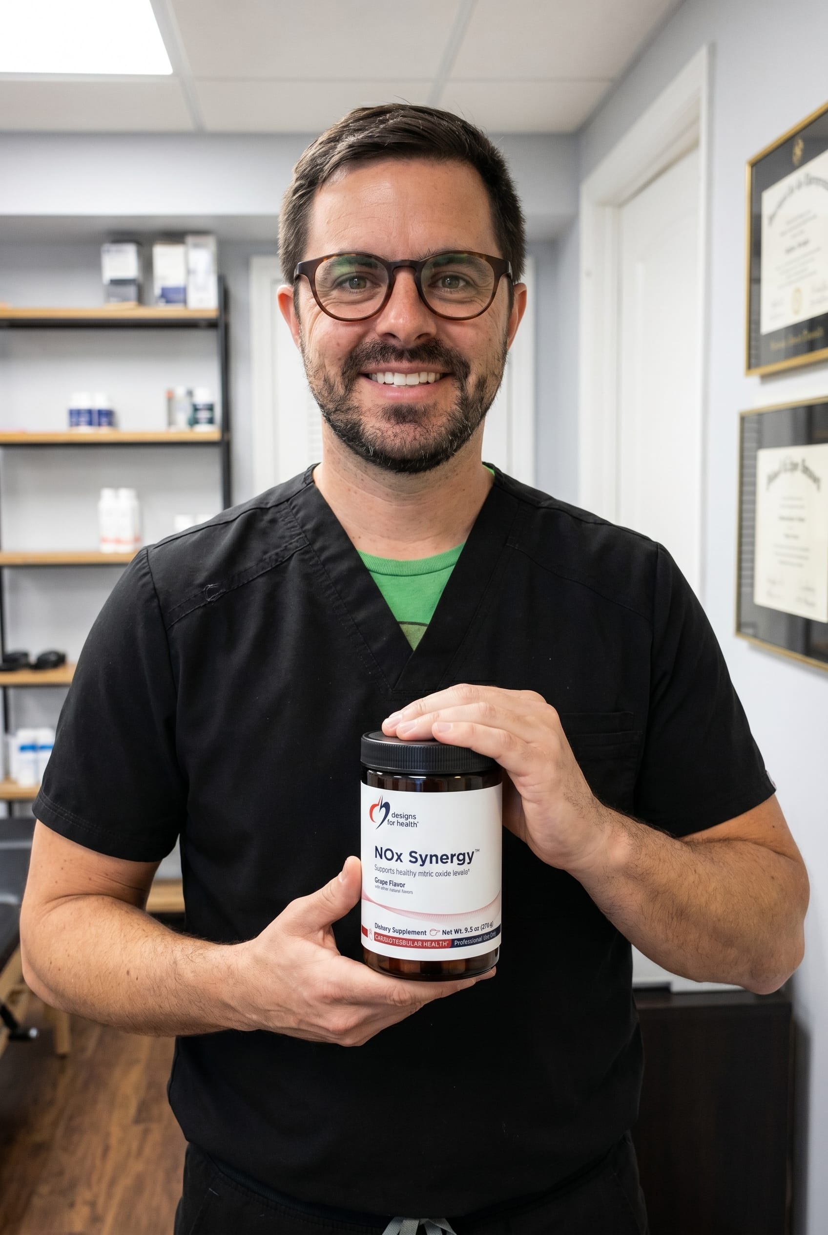 Dr. Bell holding NOx Synergy