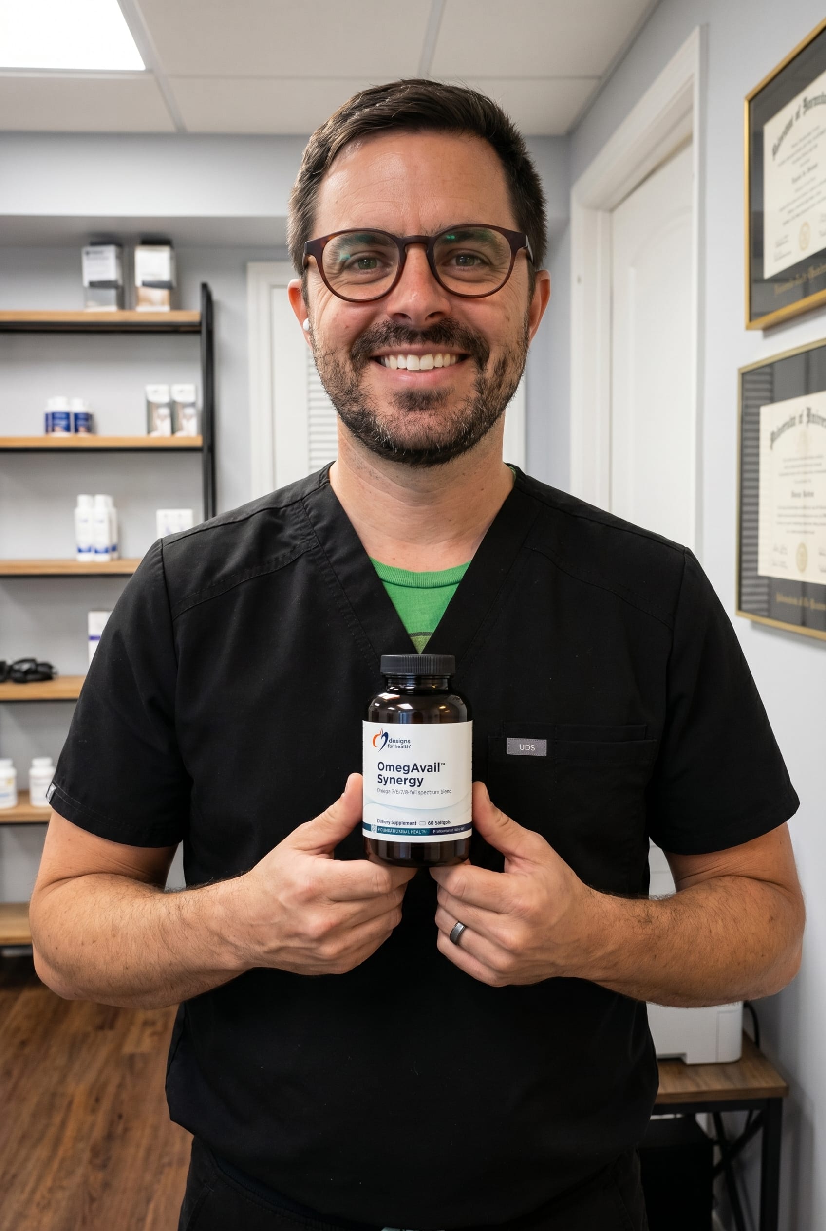 Dr. Bell holding omegavail-synergy