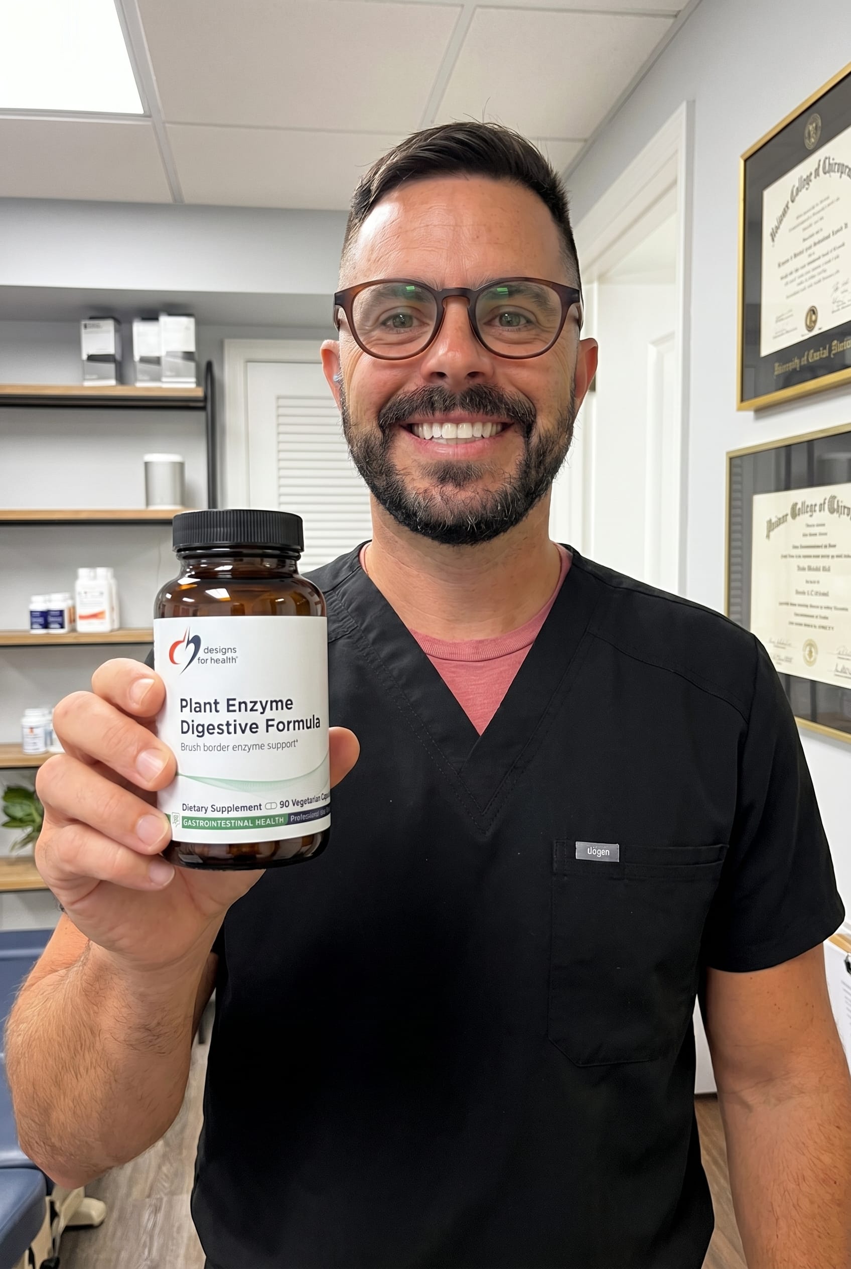 Dr. Bell holding Plant Enzyme Digestive Formula
