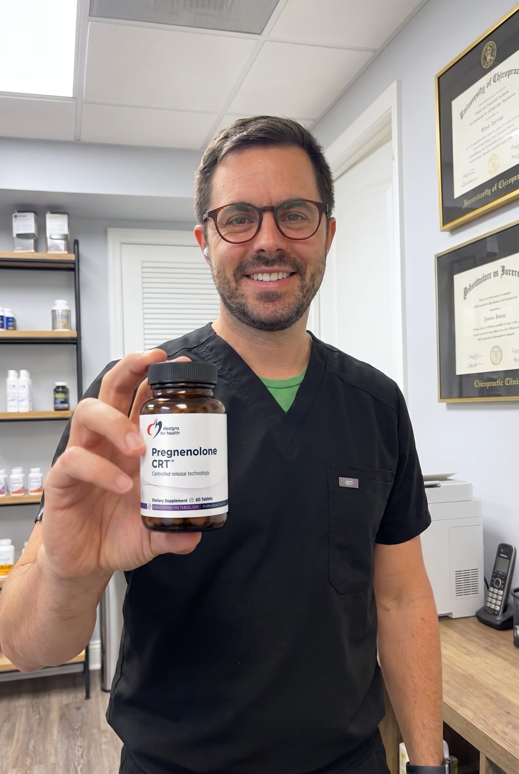 Dr. Bell holding Pregnenolone CRT