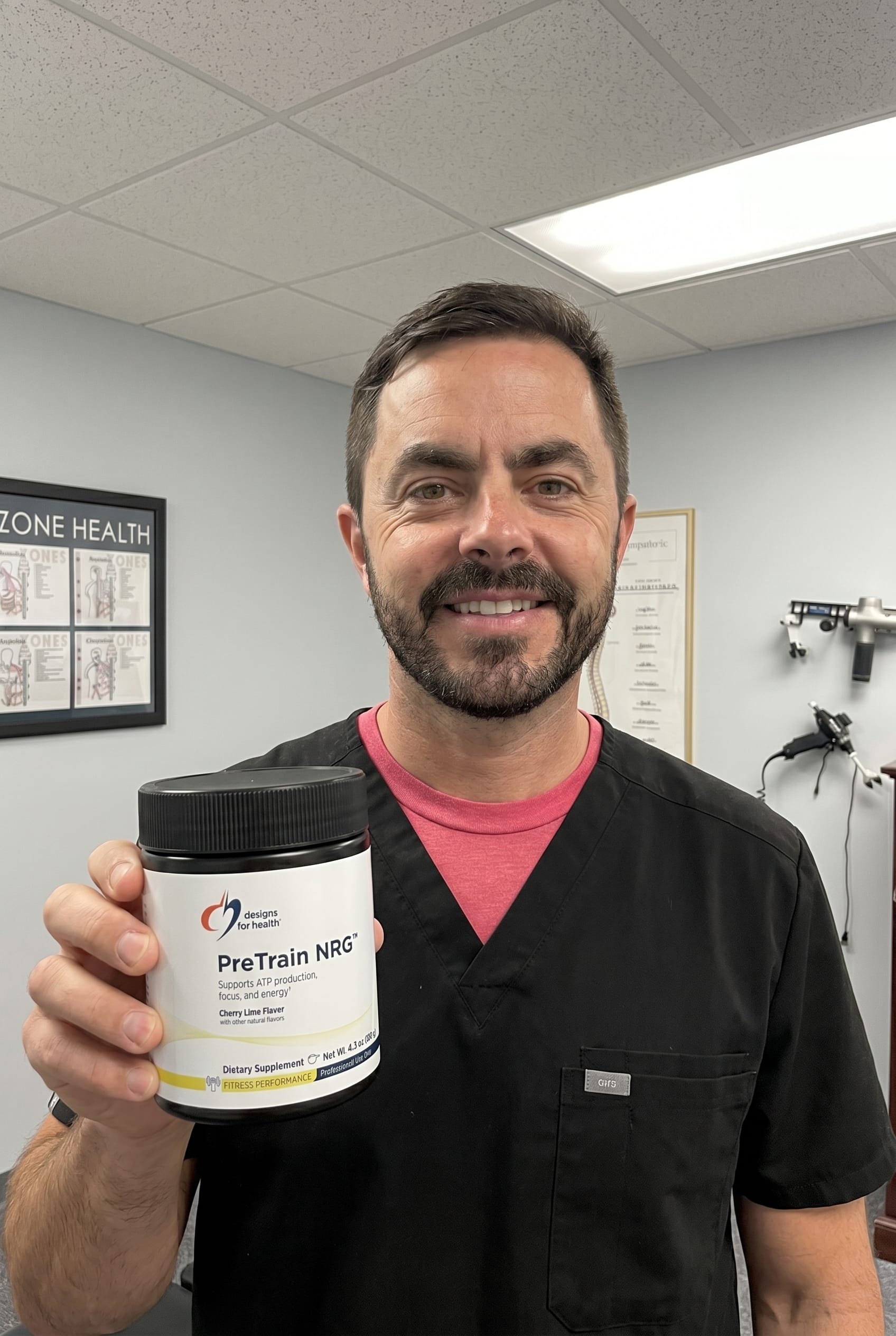 Dr. Bell holding PreTrain NRG