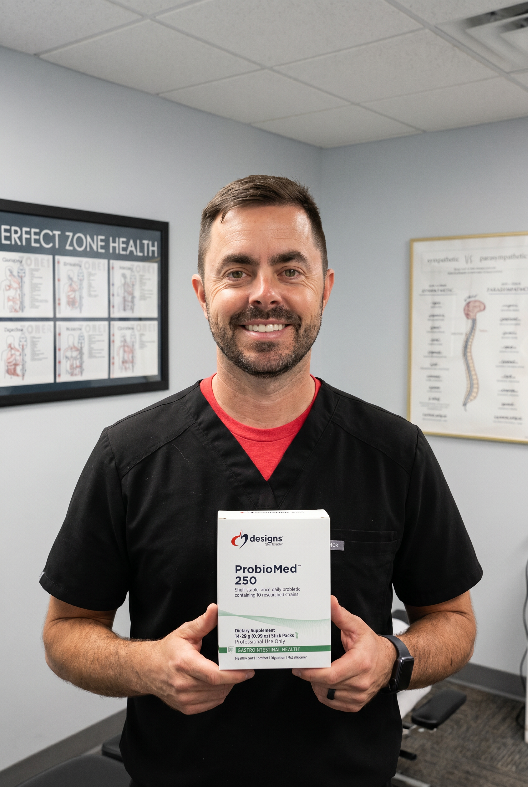 Dr. Bell holding ProbioMed 250