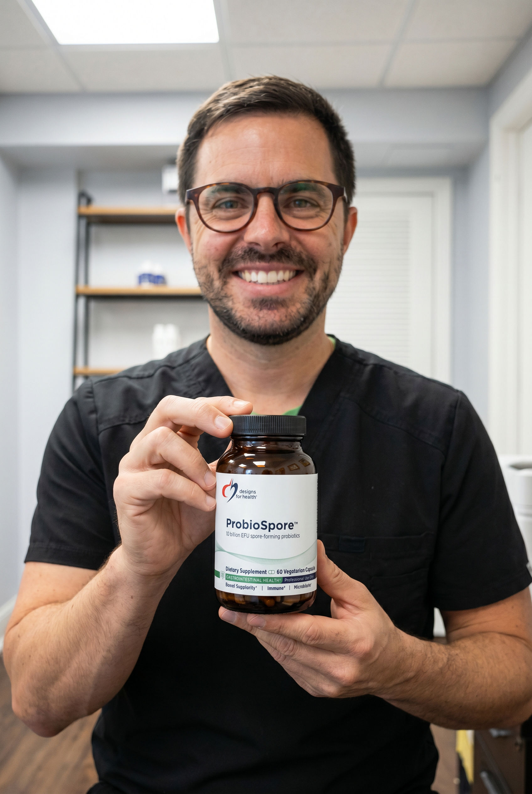 Dr. Bell holding ProbioSpore