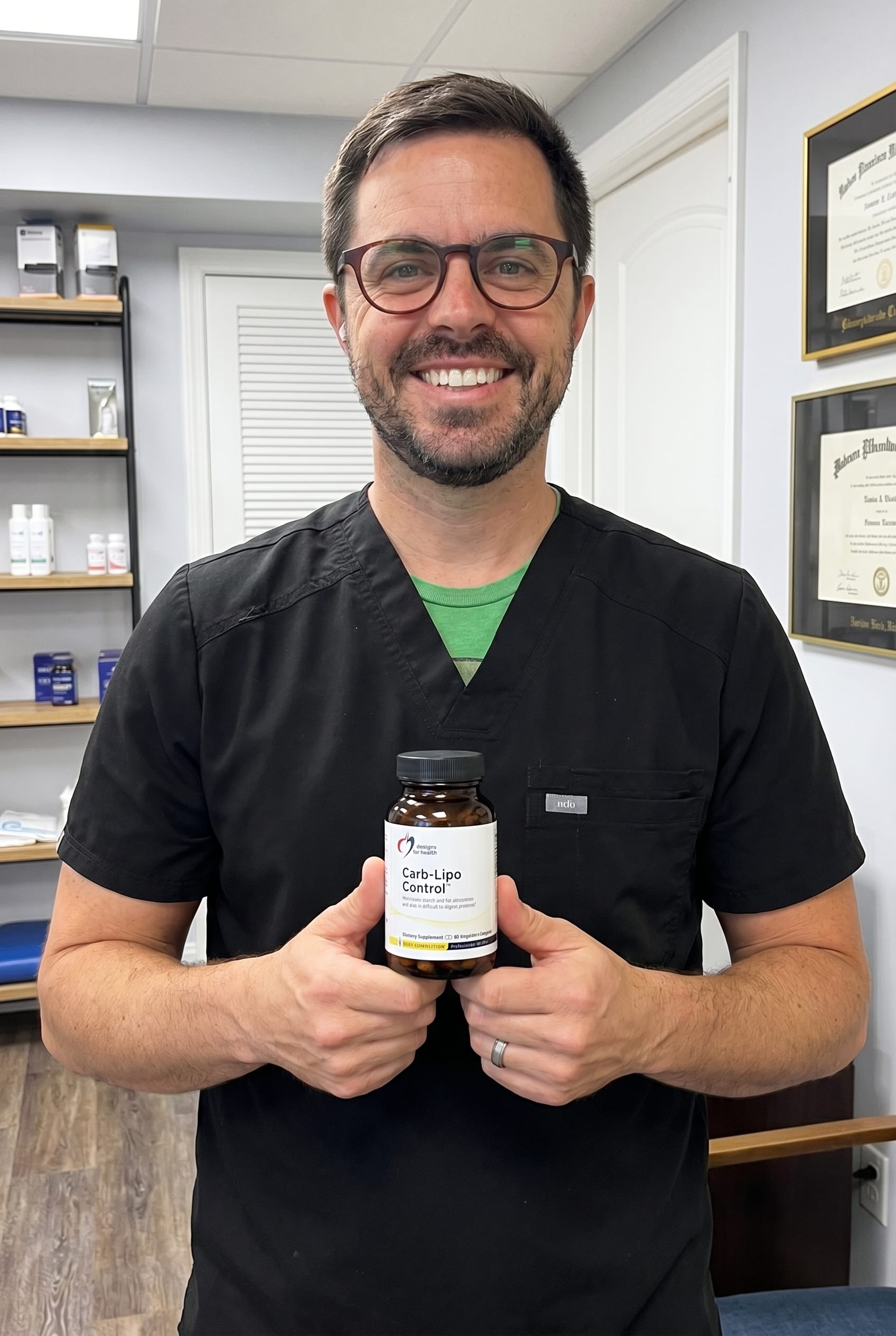 Dr. Bell holding Carb-Lipo Control