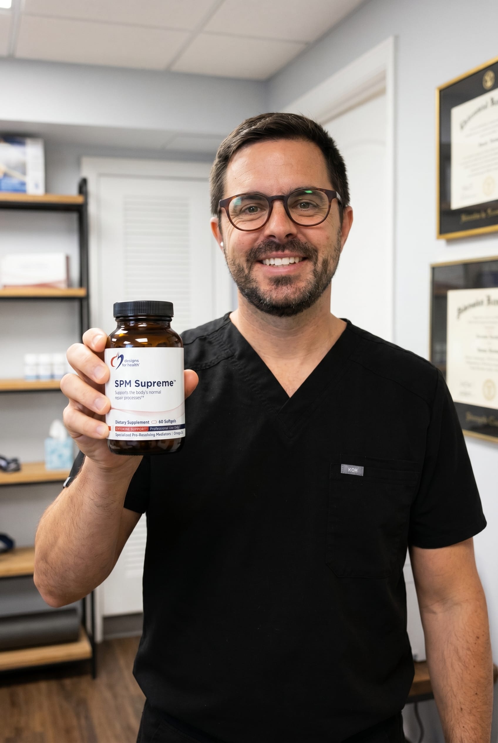 Dr. Bell holding SPM Supreme