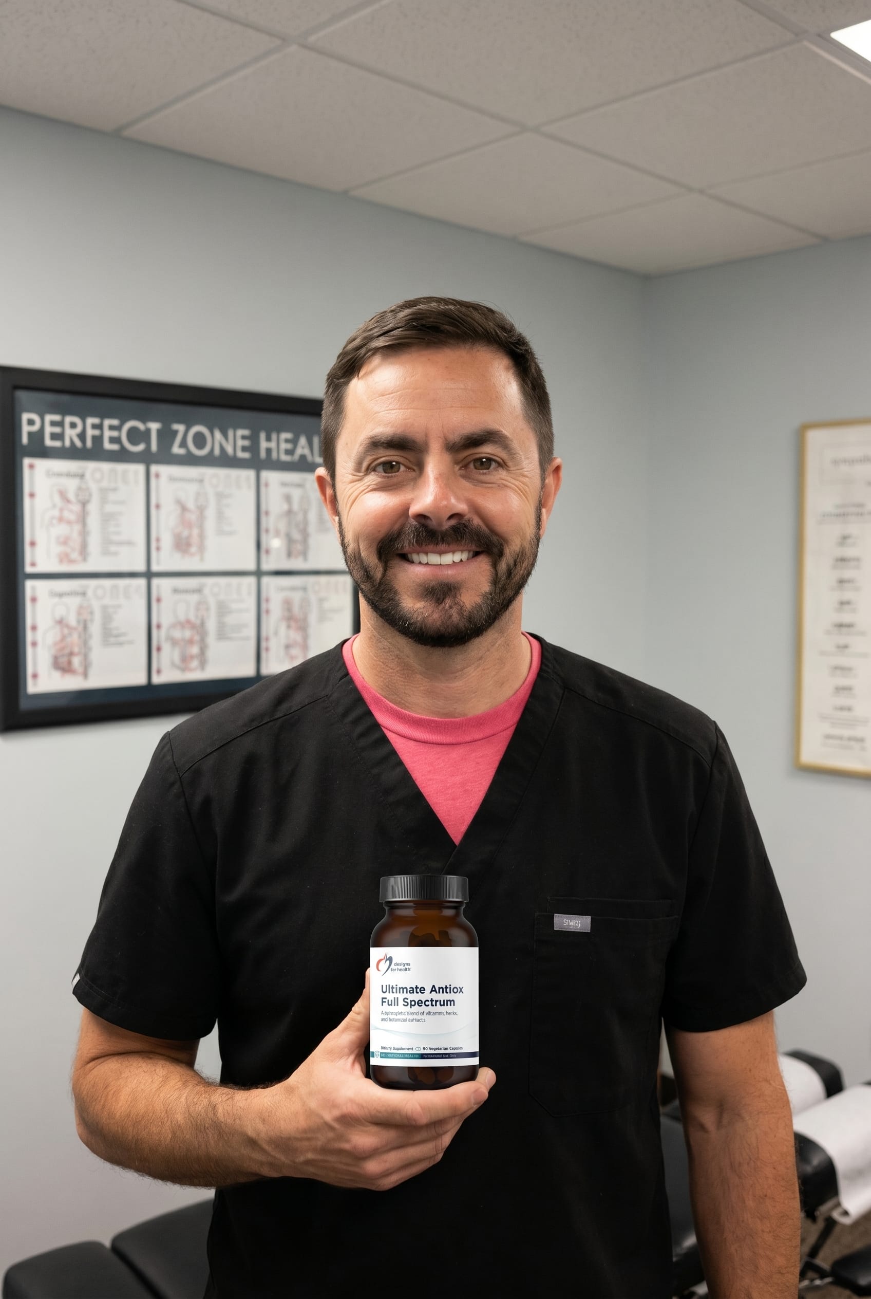 Dr. Bell holding Ultimate Antiox Full Spectrum