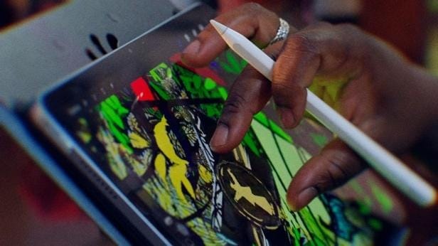 A person using a stylus on a tablet
AI-generated content may be incorrect.