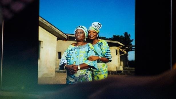 A couple of women in traditional attire
AI-generated content may be incorrect.