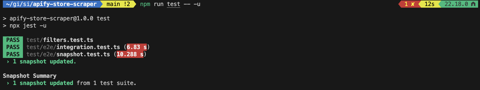 Terminal output after running 'npm run test -- -u' showing 1 snapshot updated.