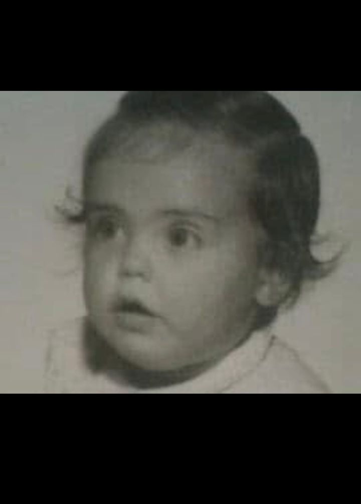A black-and-white baby picture of MEMAW.