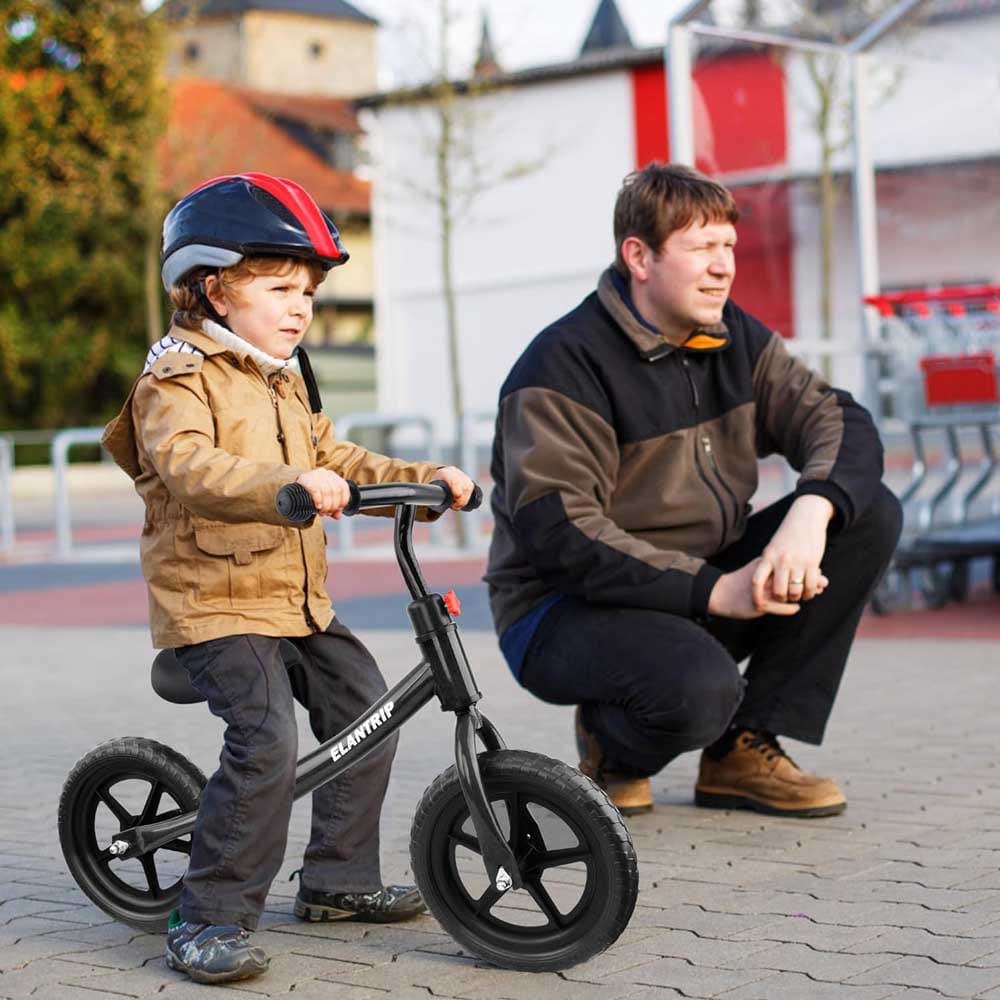 Toddler balance bike with cartoon design, adjustable seat, and thick tires — pedal-free ride-on toy for early coordination and outdoor fun