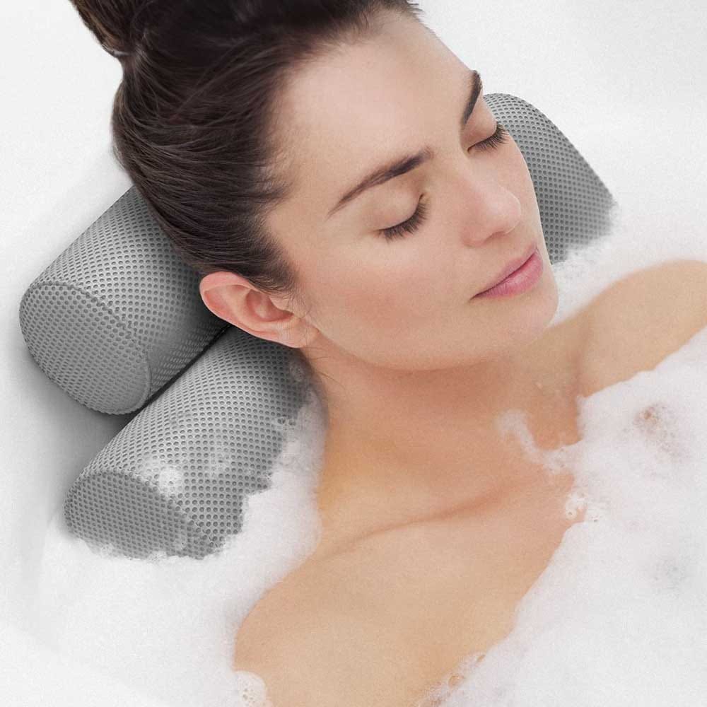 Luxury bath pillow resting in a white tub — a cozy, supportive gift for her next relaxing soak