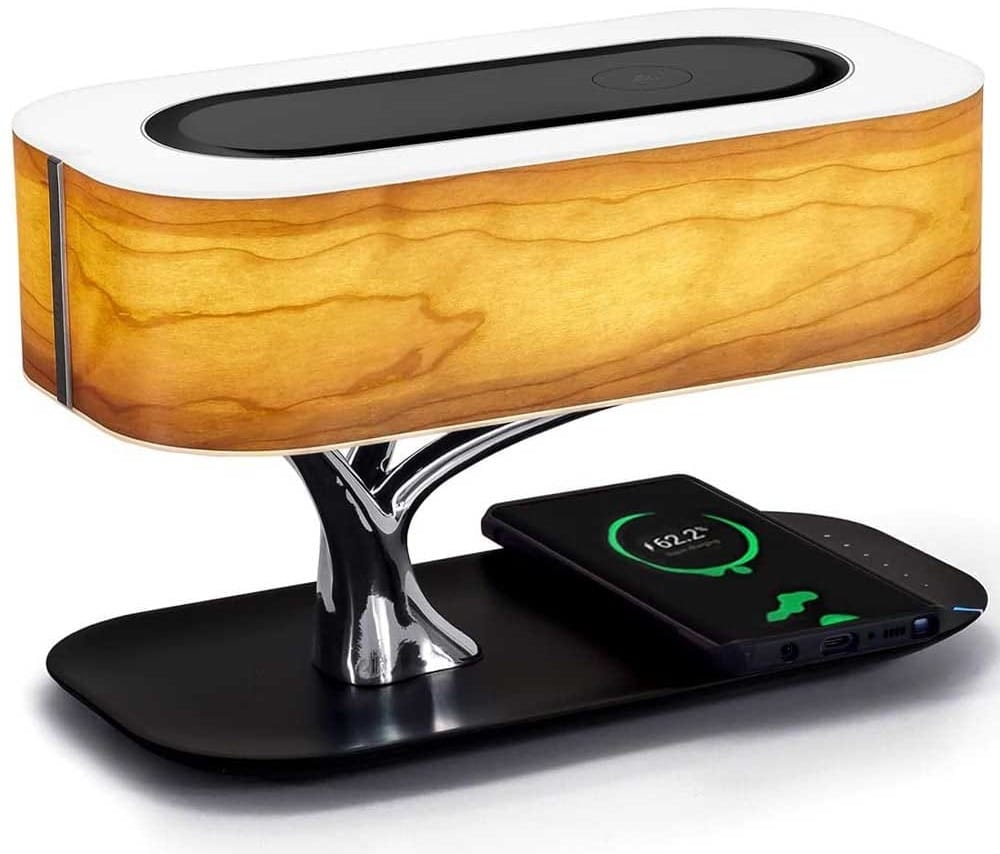 Multifunctional bedside lamp with Bluetooth speaker, wireless phone charger, and wood shade — modern gift for guys who love smart gadgets