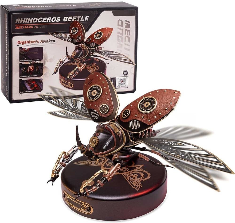 Mechanical rhinoceros beetle model kit with moving wings and motor — a unique steampunk-style DIY gift for guys who love creative builds