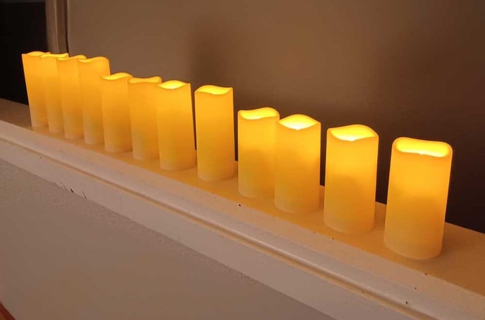 Set of 12 flameless LED candles with warm flickering light — waterproof, remote-controlled mood lighting gift for girlfriends