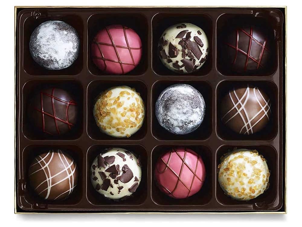 Elegant box of Godiva chocolate dessert truffles — a luxurious anniversary gift for her with indulgent flavors