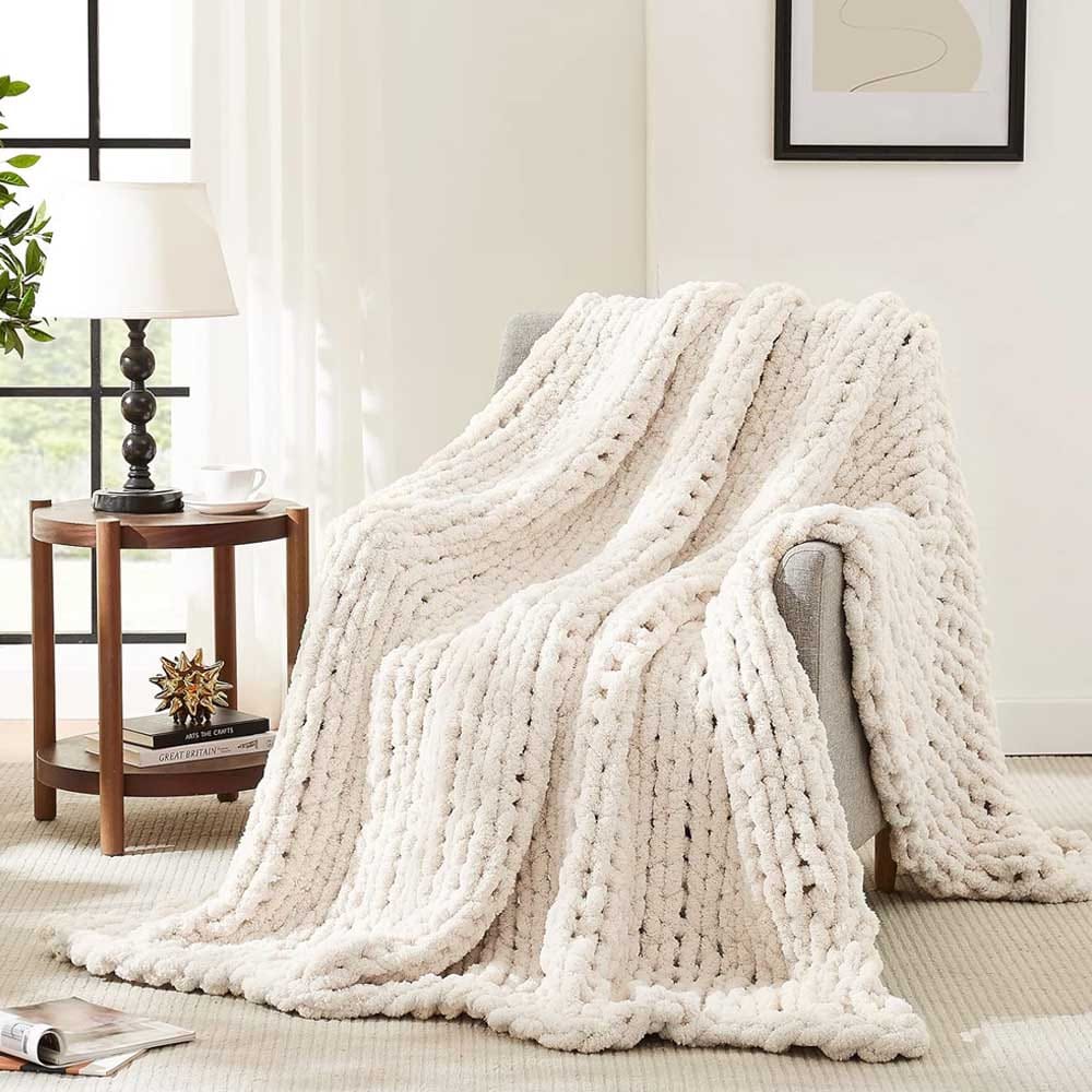 Chunky knit throw blanket made from hand-woven chenille yarn — cozy, decorative gift for engaged couples who love to snuggle up