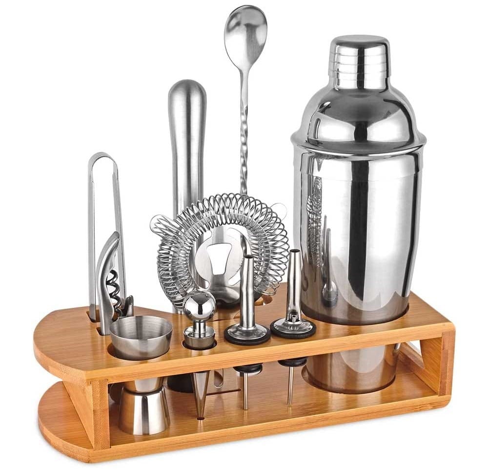 Stainless steel cocktail shaker set with bamboo stand and recipe book — the perfect gift for boyfriends who love mixing drinks or entertaining at home
