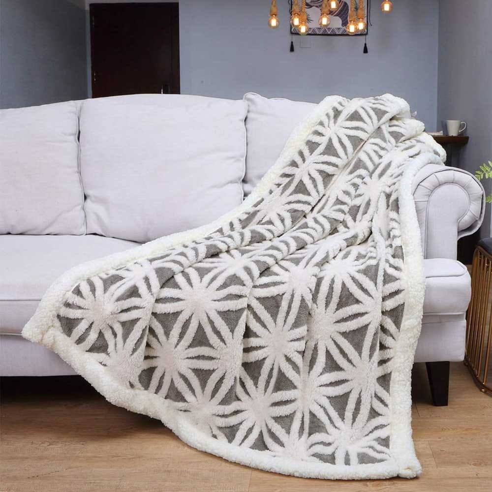 Soft sherpa fleece throw blanket with reversible design — ultra-plush and warm, perfect housewarming gift for cozy living spaces