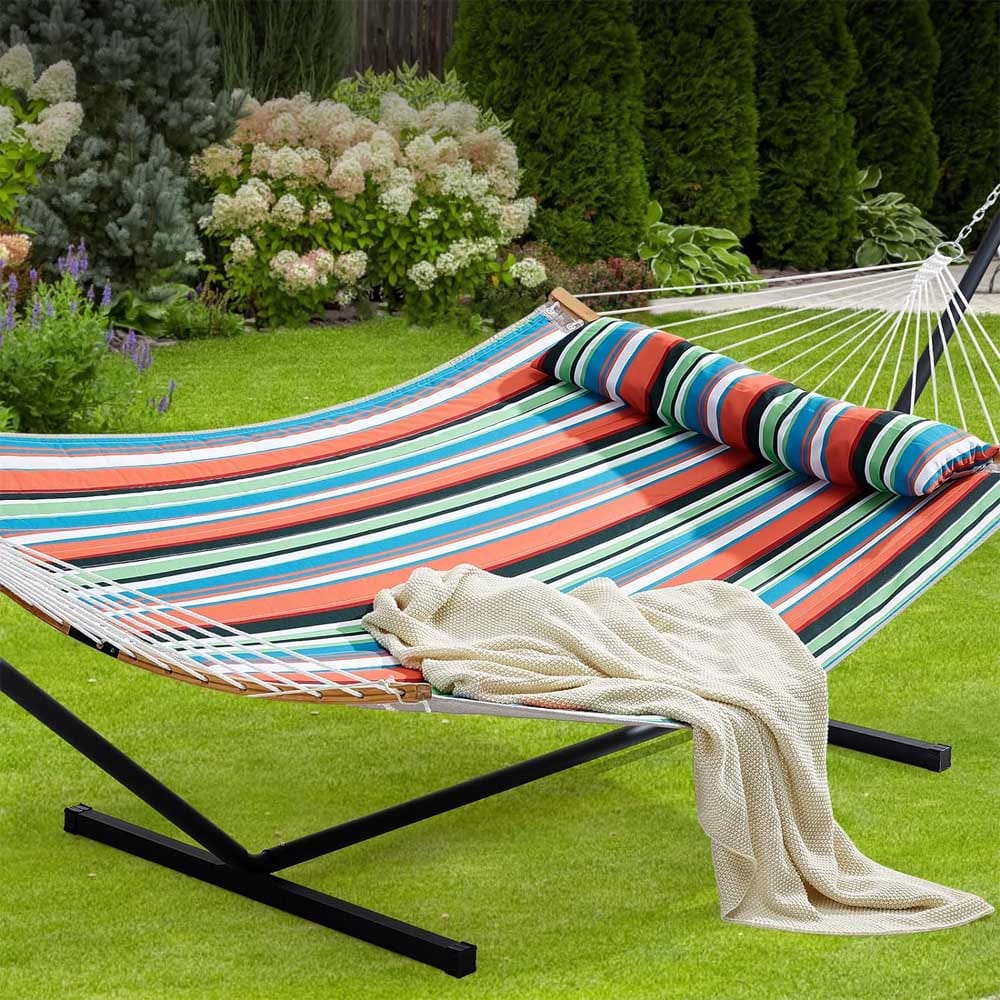 Two-person hammock with sturdy steel stand and quilted fabric — cozy, durable, and perfect for relaxing indoors or outdoors