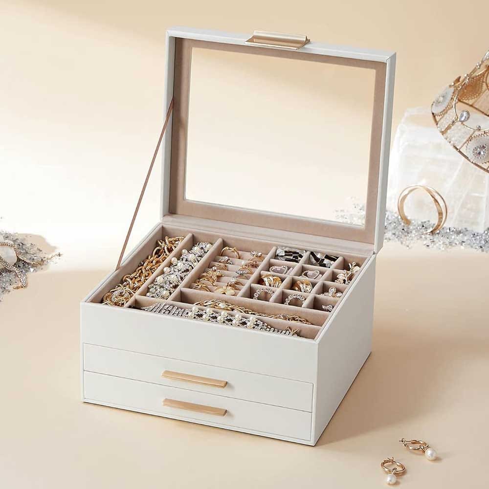 White and gold jewelry box with glass lid and velvet lining — a stylish organizer for her rings, earrings, and treasures