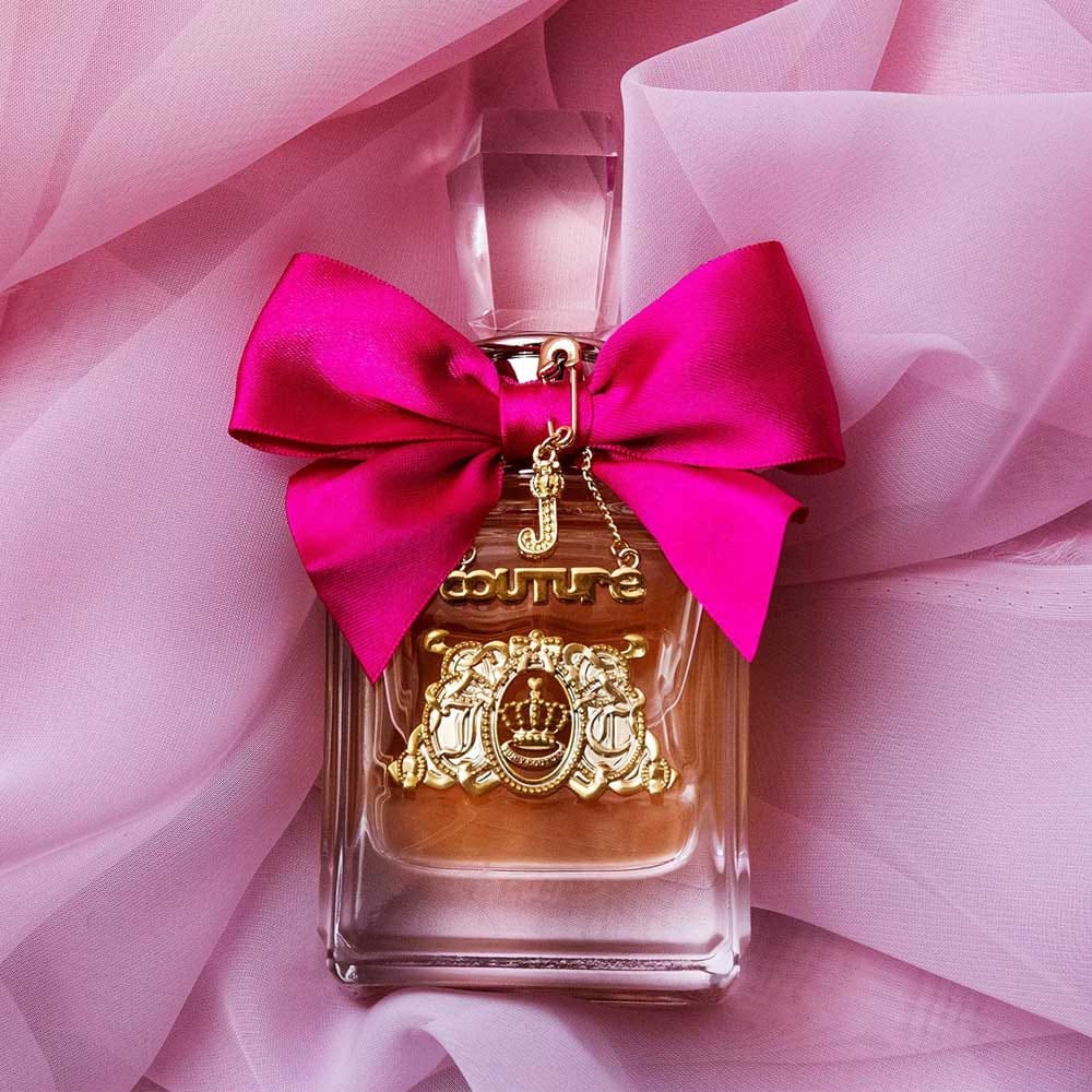 Juicy Couture Viva La Juicy perfume bottle with bow detail — fun, feminine fragrance gift for girlfriends who love bold, playful scents