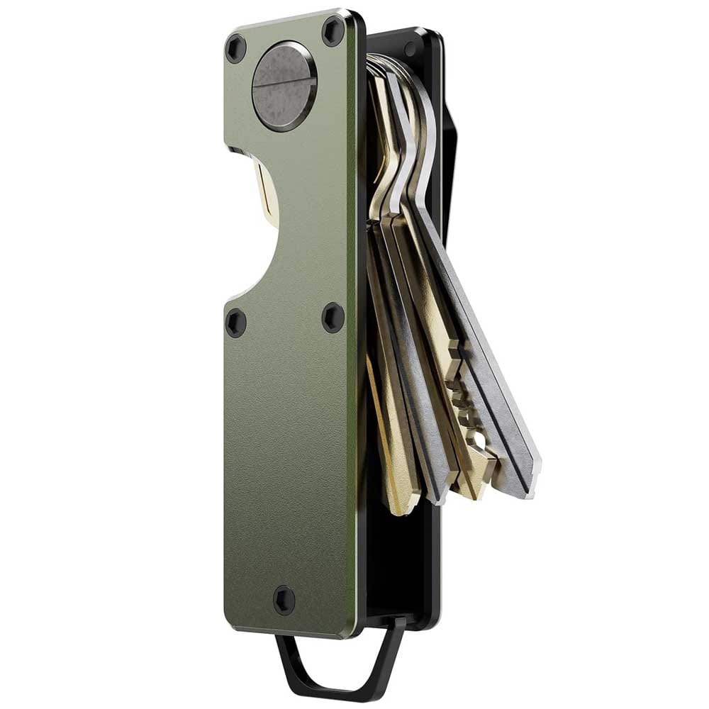 Compact metal key holder made from aluminum and carbon fiber — minimalist organizer that eliminates jangling keys and protects pockets