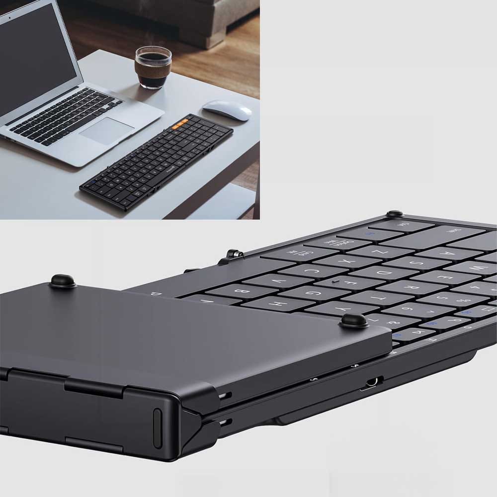 Compact foldable Bluetooth keyboard with full 105-key layout, number pad, quiet scissor switches, and multi-device sync — perfect gift for tech-savvy men
