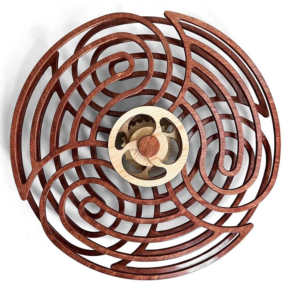 Wooden kinetic wall art with hypnotic ripple motion — wind-up mechanical sculpture for mindful, modern decor