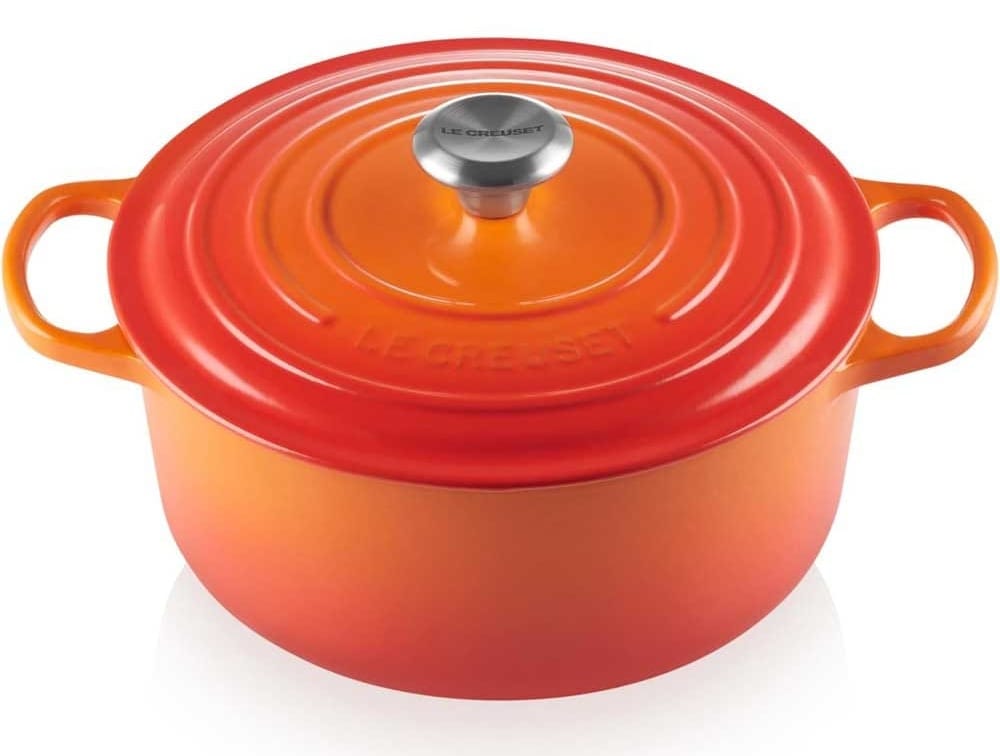 Le Creuset Dutch oven with colorful enameled finish and stainless steel knob — heirloom-quality cookware gift for engaged couples who love to cook