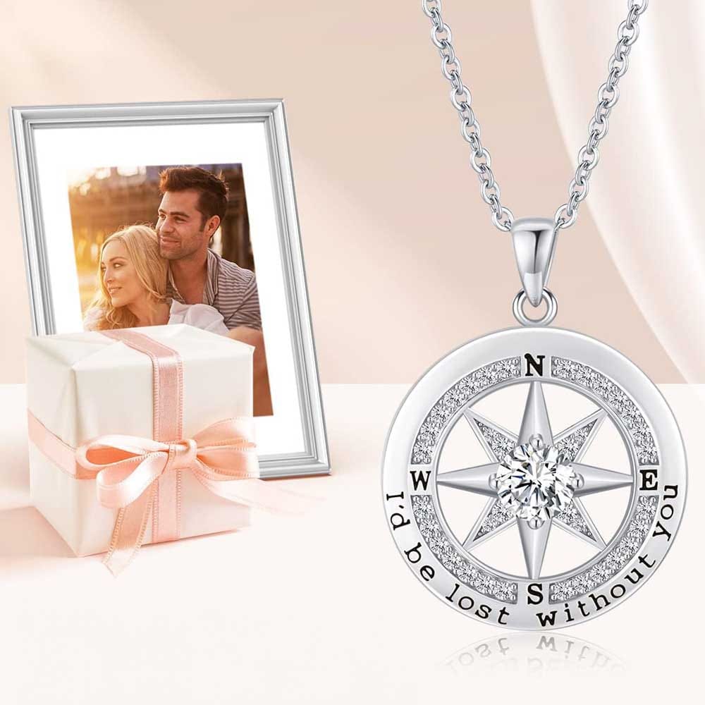 Silver compass necklace engraved with 'I'd be lost without you' — a sentimental anniversary gift for her