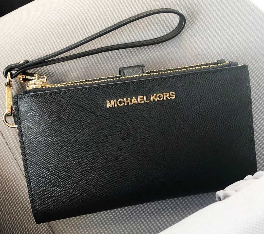 Michael Kors Jet Set Travel wristlet in Saffiano leather with gold-tone hardware — compact, stylish accessory for teen girls