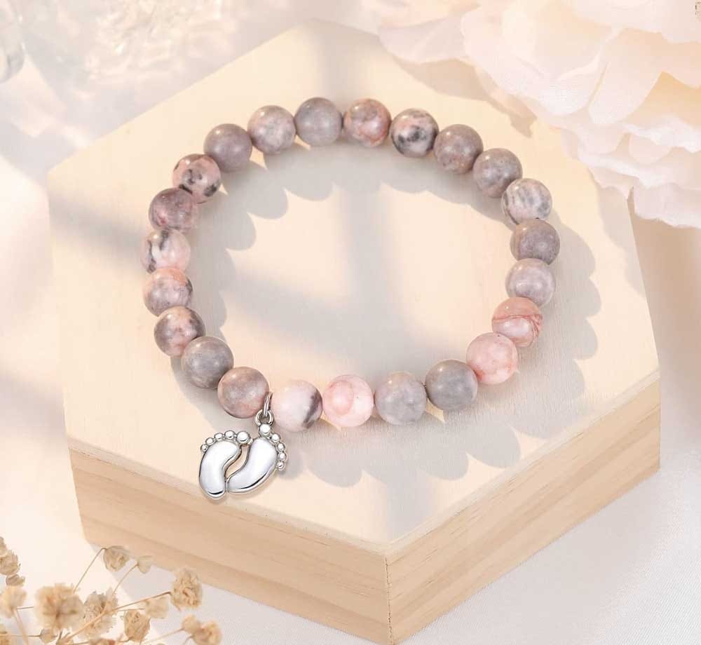 Delicate stainless steel bracelet with round stone beads and elastic cord — meaningful keepsake gift for new moms