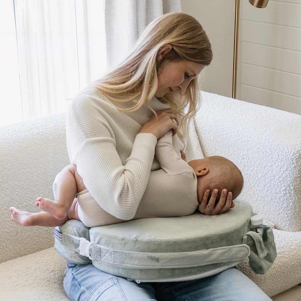 Ergonomic nursing pillow with back support and side pocket — ideal for breastfeeding comfort and postpartum support