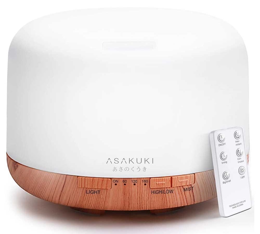 Sleek 5-in-1 essential oil diffuser with LED lights and remote — a soothing anniversary gift for creating calming spaces
