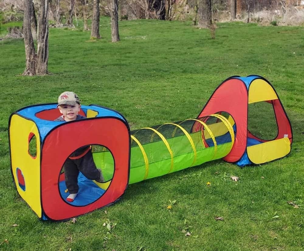 Colorful pop-up toddler play tent with tunnel and ball pit — outdoor adventure tent set made from durable polyester for active imaginative play