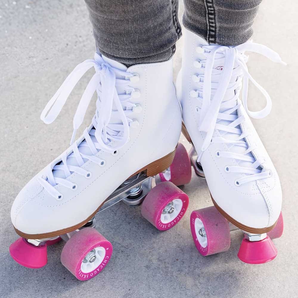 Classic white quad roller skates with high-top design and sturdy wheels — a stylish, retro-inspired gift for girlfriends who love to roll