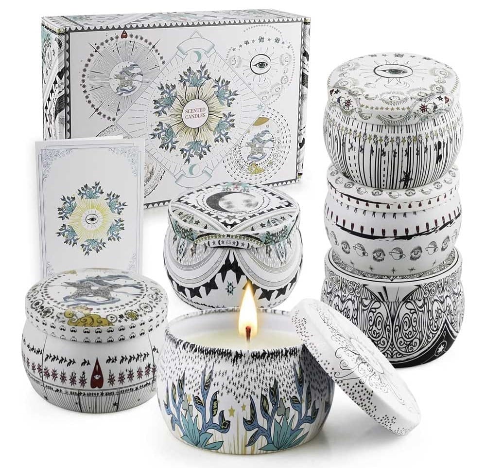 Set of beautifully packaged scented candles with floral and herbal fragrances — a relaxing anniversary gift for her