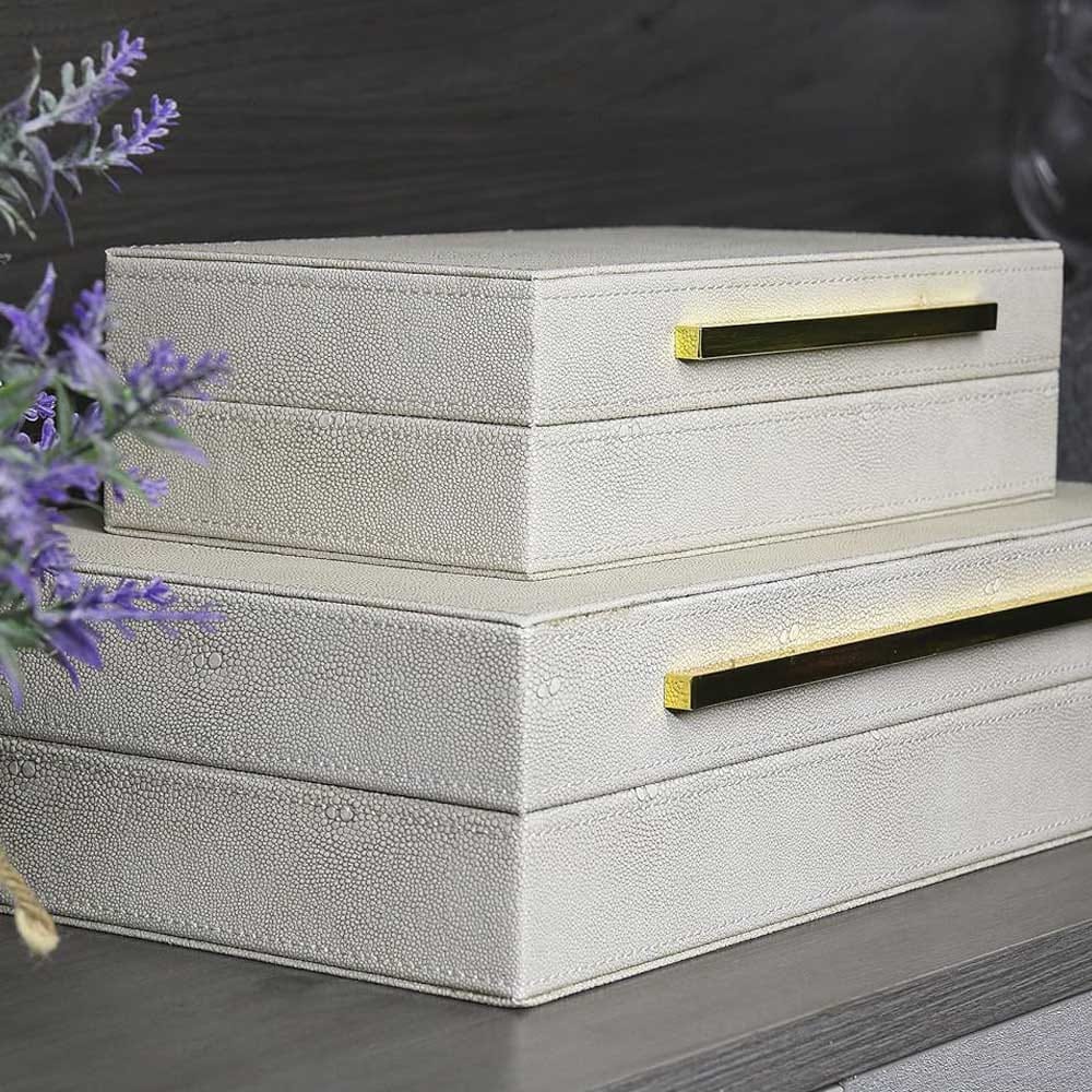 Set of elegant faux shagreen leather storage boxes with gold accents — a chic and practical anniversary gift for wives who love stylish home organization