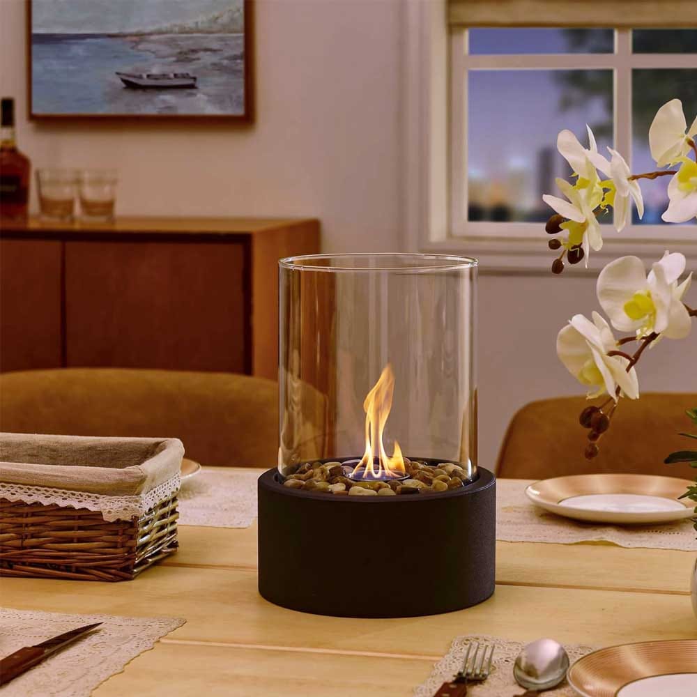 Sleek tabletop fire pit with clear glass and metal base — clean-burning home decor gift for cozy ambiance in new homes