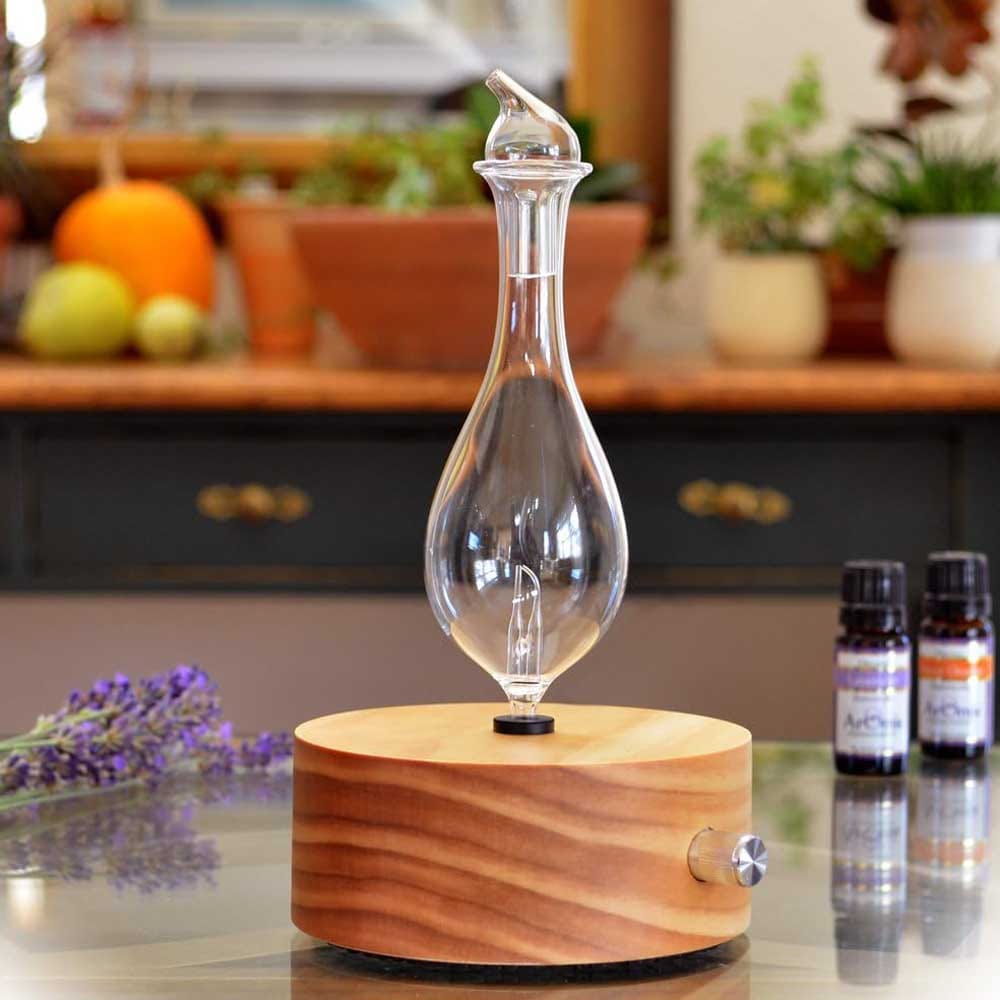 Elegant essential oil diffuser with hand-blown glass top and wooden base — stylish aromatherapy gift for engaged couples