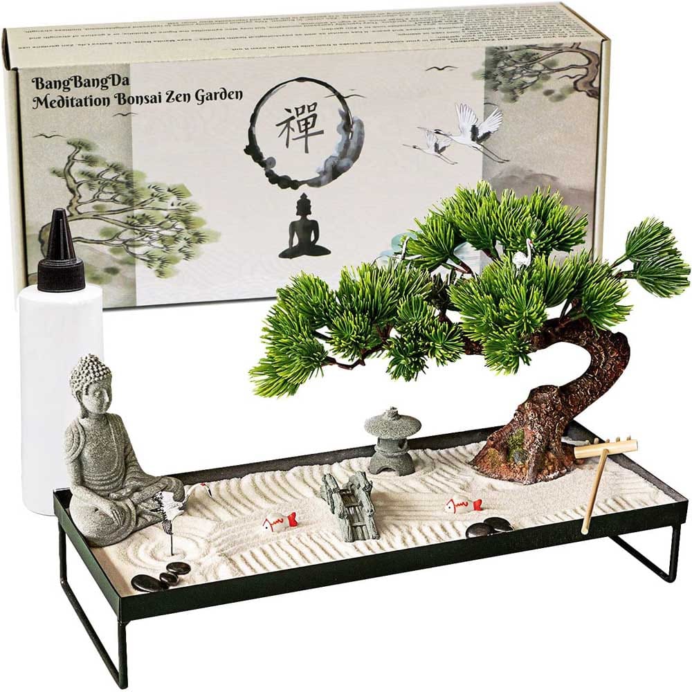 Miniature Zen garden with bonsai tree, Buddha statue, sand, rake, and crane figurine — a calming desk decor gift for relaxation