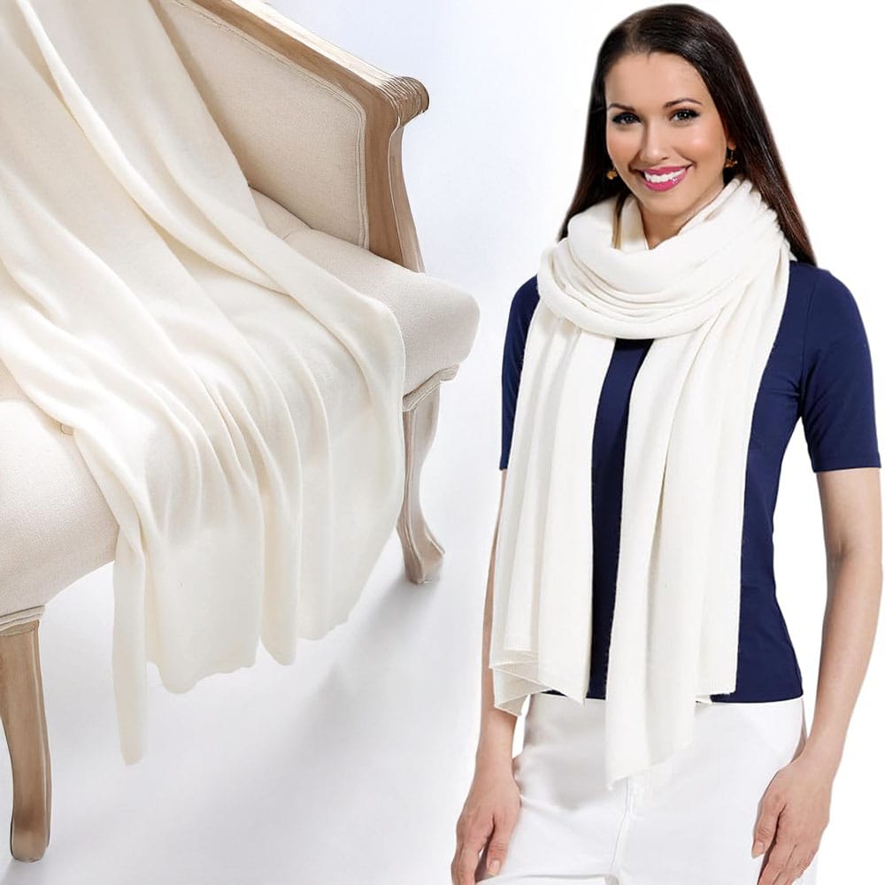 Elegant cashmere wrap in soft gray, folded and gift-boxed — a premium, cozy accessory for stylish dog walkers