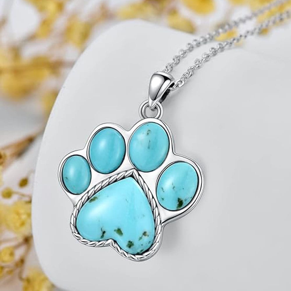 Sterling silver necklace with turquoise paw print pendant — a heartfelt gift for pet lovers and dog walkers alike